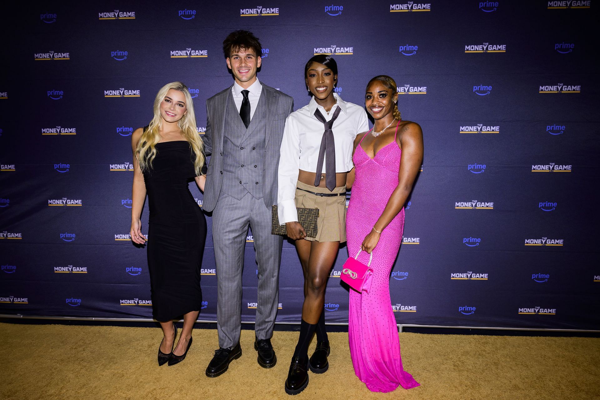 Olivia Dunne, Trace Young, Flau’jae Johnson and Alia Armstrong of the LSU Tigers pose for a photo during The Money Game World Premiere at Pete Maravich Assembly Center on September 4, 2024 in Baton Rouge, Louisiana - Source: Getty